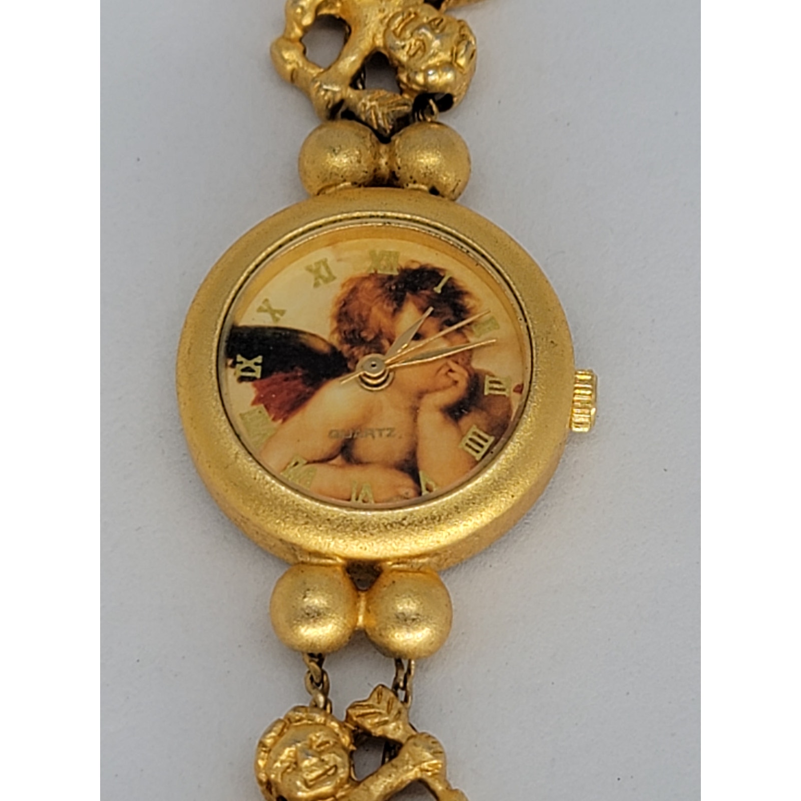 Vintage Cherub Angel Christian Women's Gold Tone Roman Numeral Petite Watch